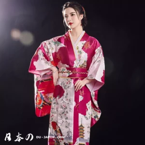 Femme en kimono rose élégant, mettant en valeur la beauté de la culture japonaise.