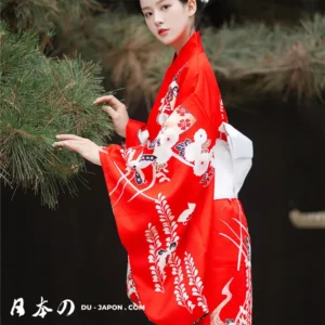 Femme en kimono rouge élégant, symbole de la culture japonaise et de la sérénité naturelle.