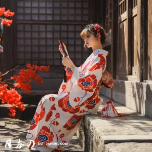 Femme en kimono traditionnel japonais, reflet de sérénité et beauté dans la nature.