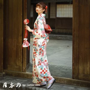 Femme en kimono vibrant dans un cadre japonais traditionnel, élégance et sérénité.