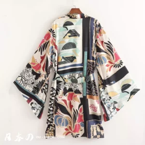 Kimono moderne fleuri rouge, bleu et vert, alliant tradition et élégance contemporaine.