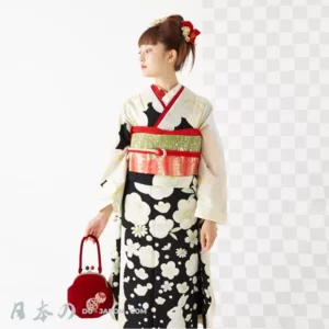 Jeune femme en kimono noir avec obi rouge et fleurs, élégance japonaise traditionnelle.