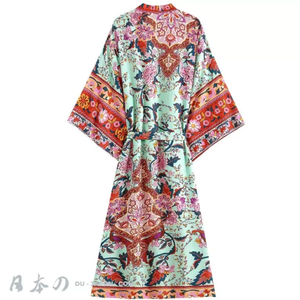 Robe kimono en teal avec motifs floraux, élégante et confortable pour la plage.