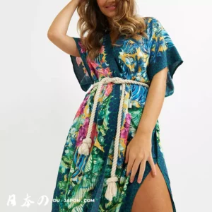 Robe tropicale colorée pour femme, idéale pour lété et les sorties à la plage.